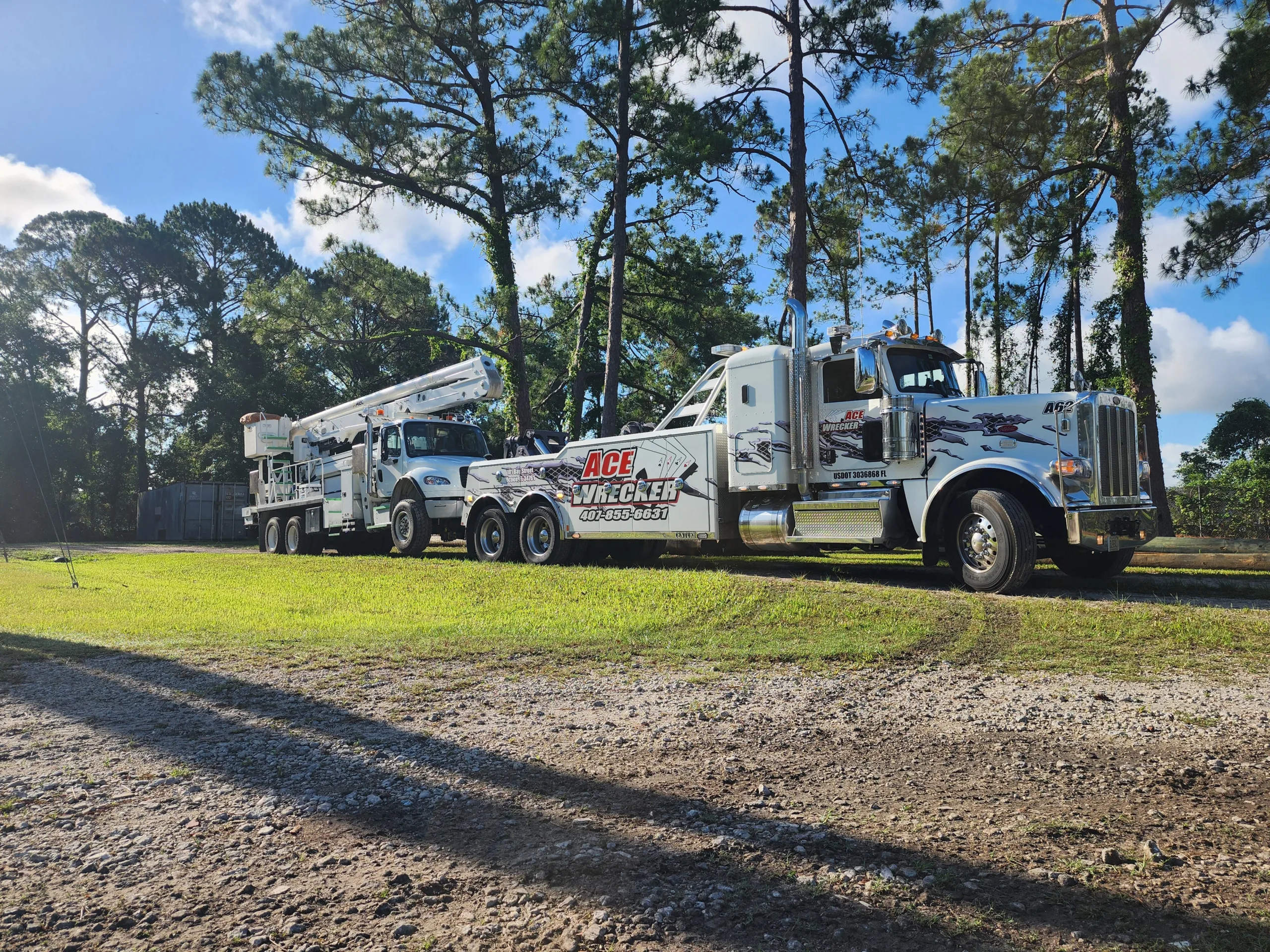 Ace-Heavy-Duty-Towing Ace Wrecker Service Heavy Duty Wrecker towing an electric service truck